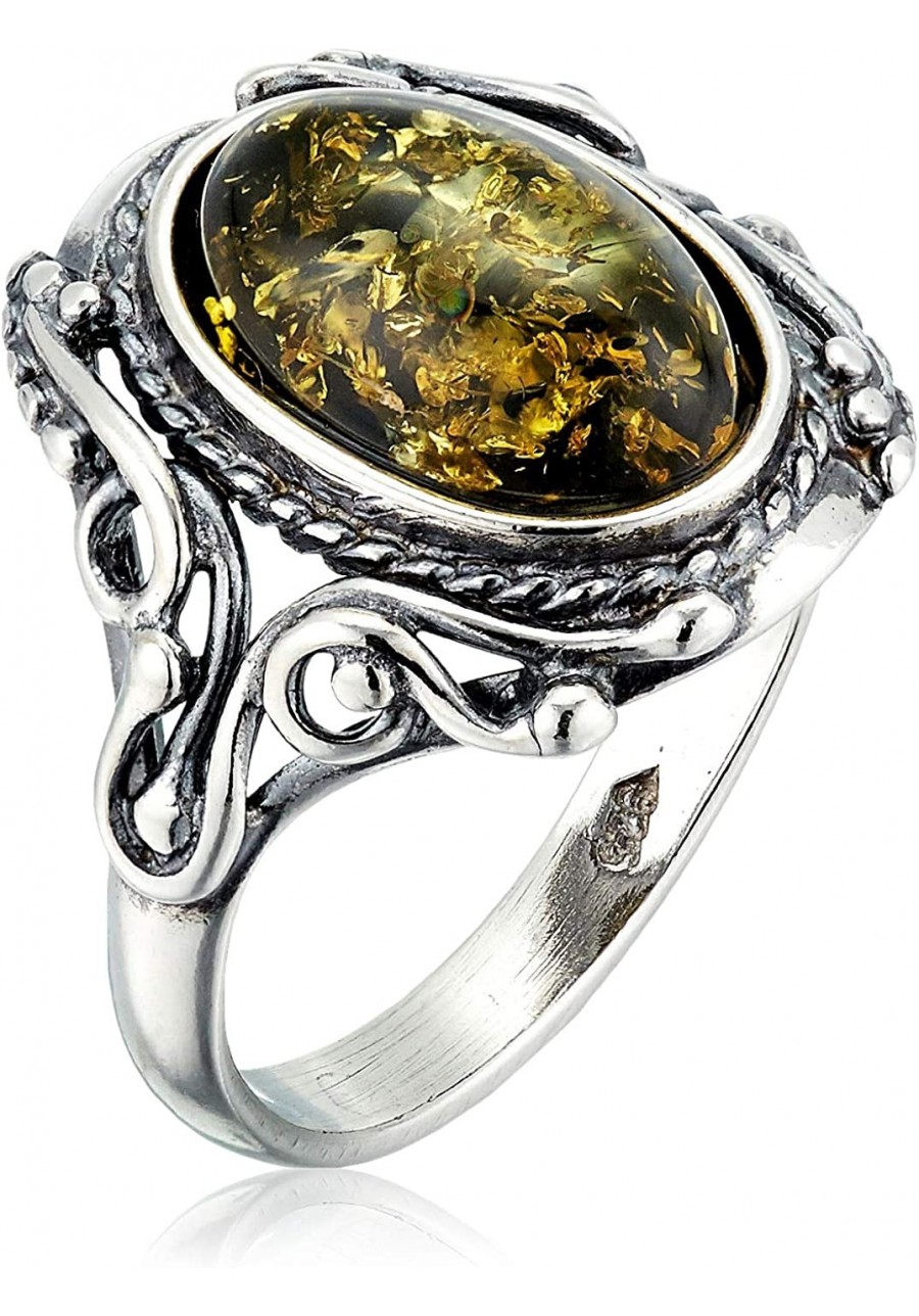 Sterling Silver and Baltic Green Amber Ring Georgine $21.96 Statement